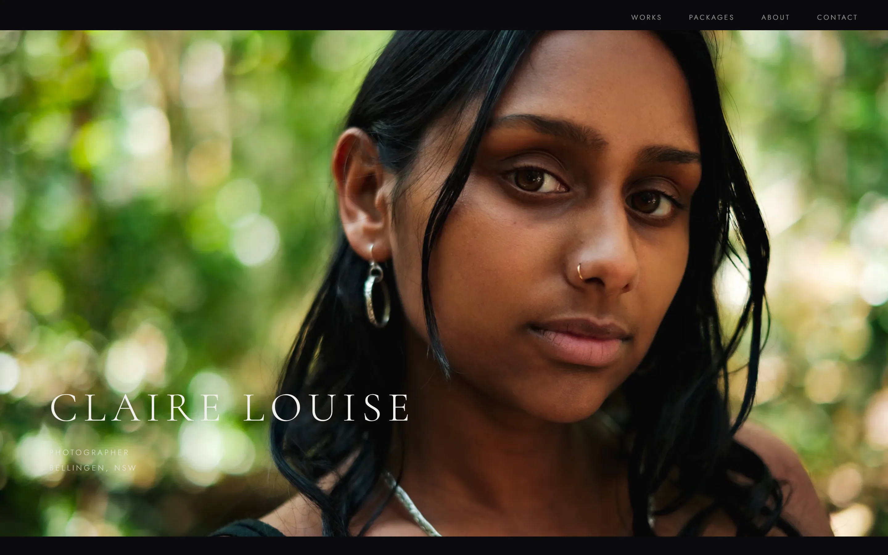 The Claire Louise website on a laptop
